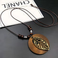 Wooden leaf ethnic necklace with adjustable wax line chain and electroplated pendant