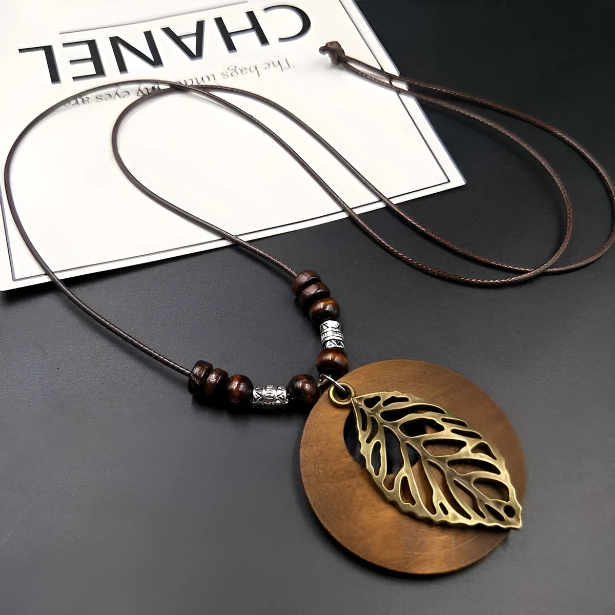 Wooden leaf ethnic necklace with adjustable wax line chain and electroplated pendant