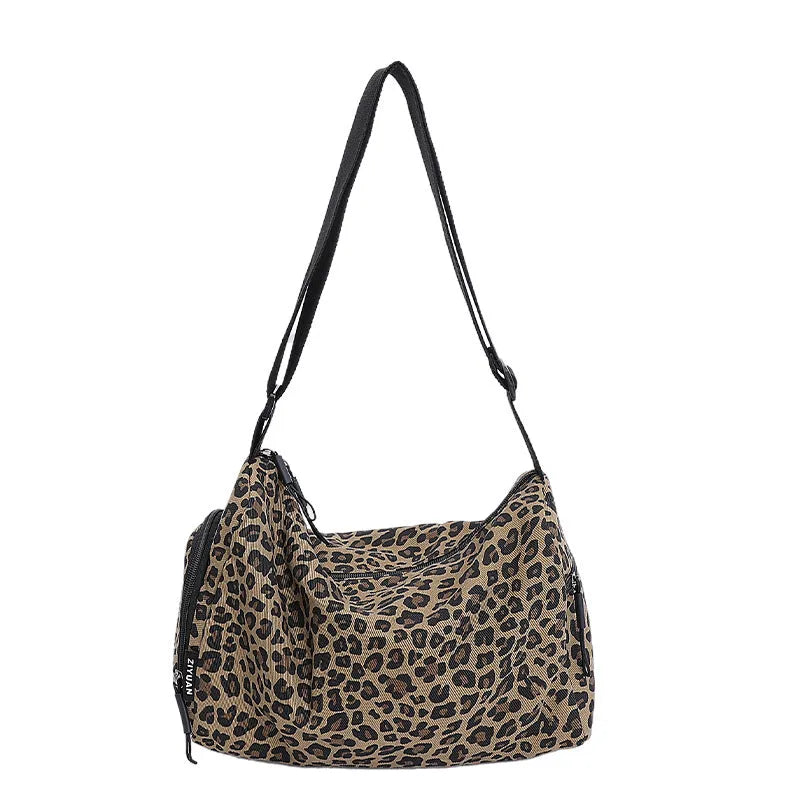Leopard print sports style shoulder messenger bag with cross-body strap and large capacity design