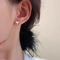 Women's fishtail design earrings in electroplated copper with white gold or yellow gold finish