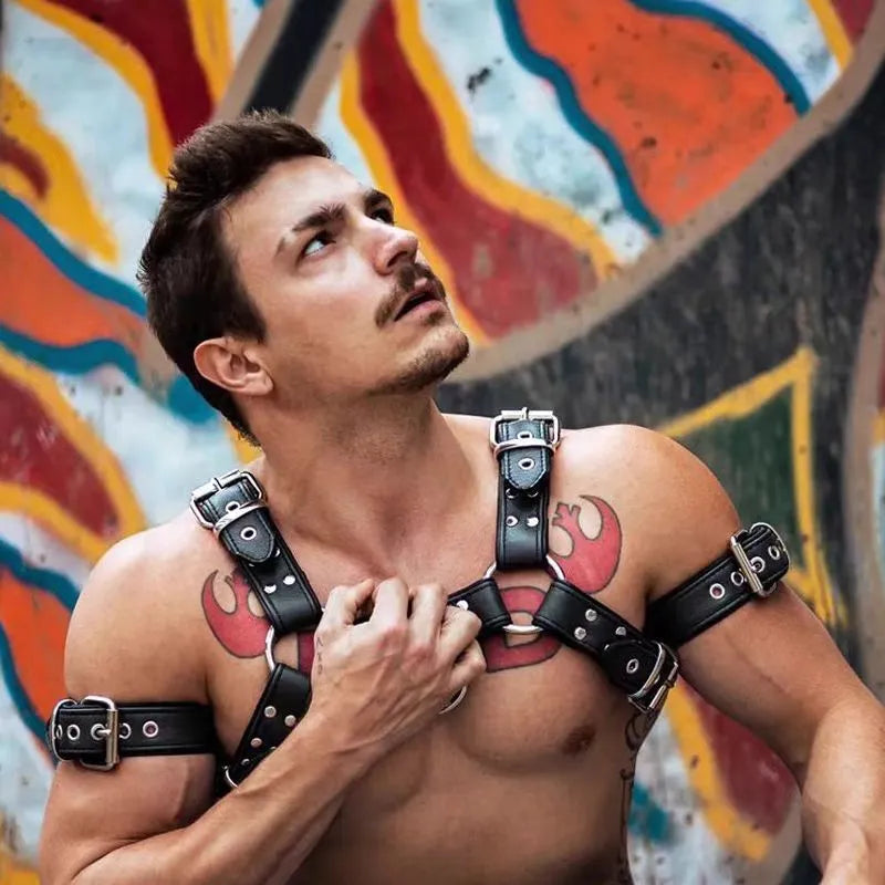 Black leather adjustable chest muscle bondage strap with metal buckle fastening