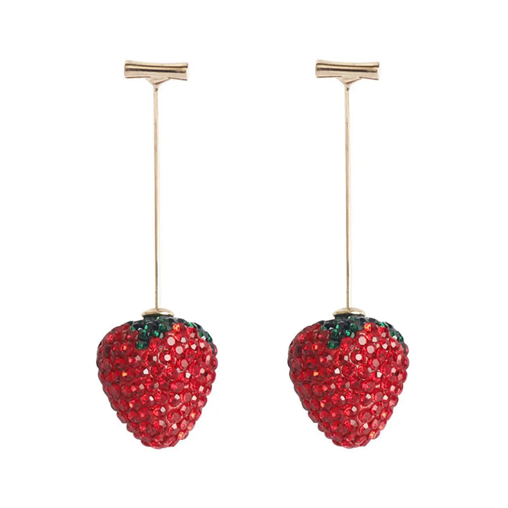 Close-up of geometric spot-drill strawberry stud earrings in red zinc alloy, shown on a plain background.