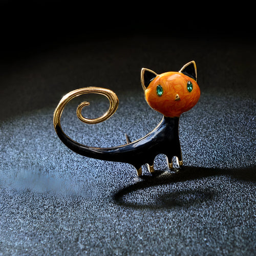 Alloy cat brooch with painted tail detail in white or orange colour for women's decorative fashion accessory