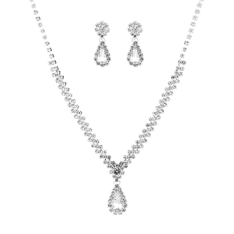Claw chain necklace and earrings set with drop-shaped rhinestone pendants in multiple colour options