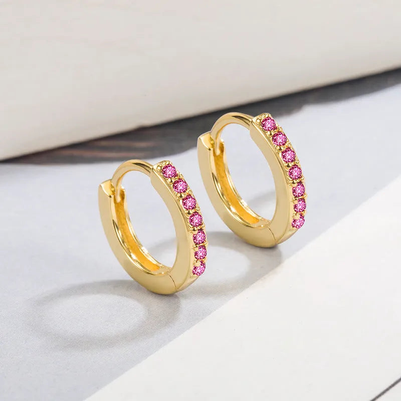 Gold-tone copper geometric hoop earrings with inlaid zircon in black, red, or green, one pair