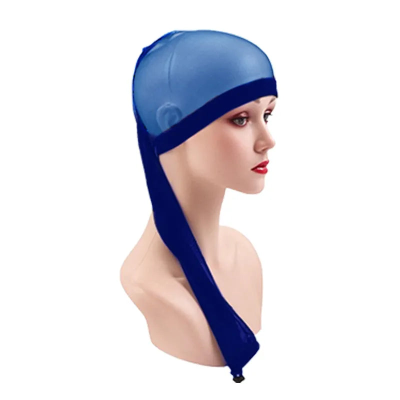 Mesh wig cap with elastic oversleeve design shown in various colour options including leopard print