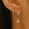 Ladies three-piece earring set showing ear ring, stud earring and ear clip with zircon diamond geometry pendants