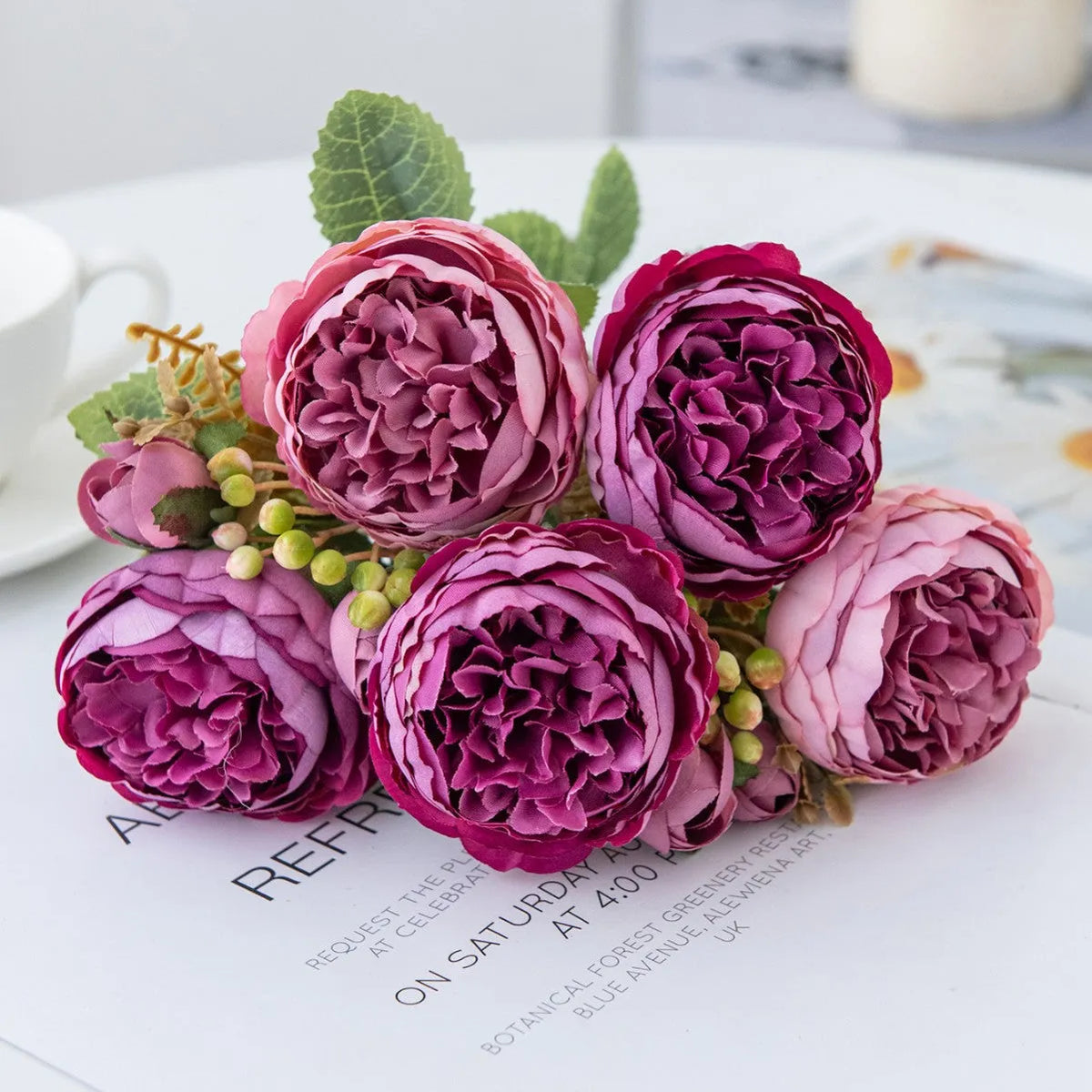 Silk artificial peony bouquet in champagne colour for table decoration