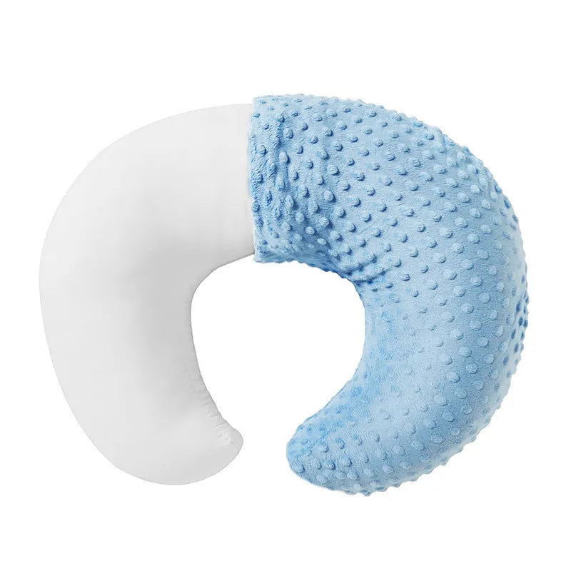 Pink nursing pillow with removable cover for breastfeeding and bottle feeding support.