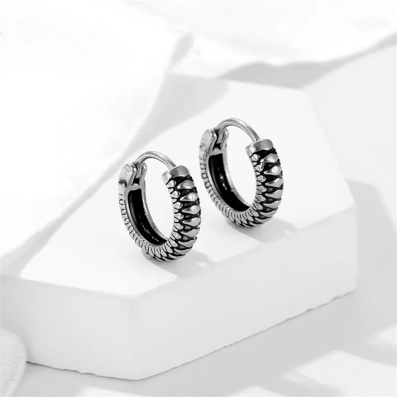 Geometric round retro twist earrings with striped patterns in silver titanium steel