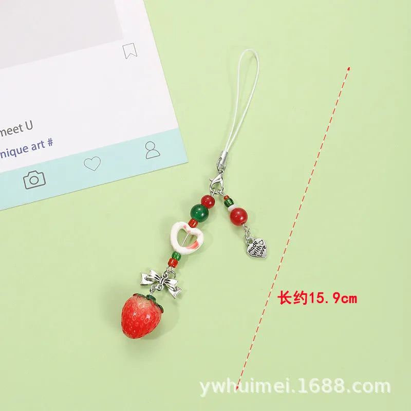 Plastic resin mobile phone charm keychain with fruit designs including apple and strawberry patterns
