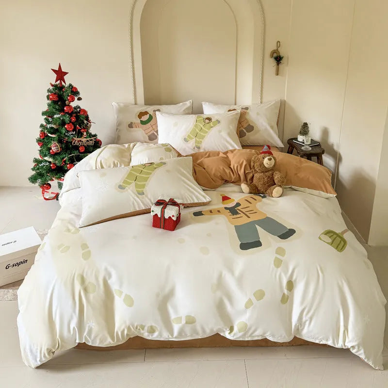 Christmas cartoon print bedding set with gingerbread man design on washed cotton, showing duvet cover and pillowcases.