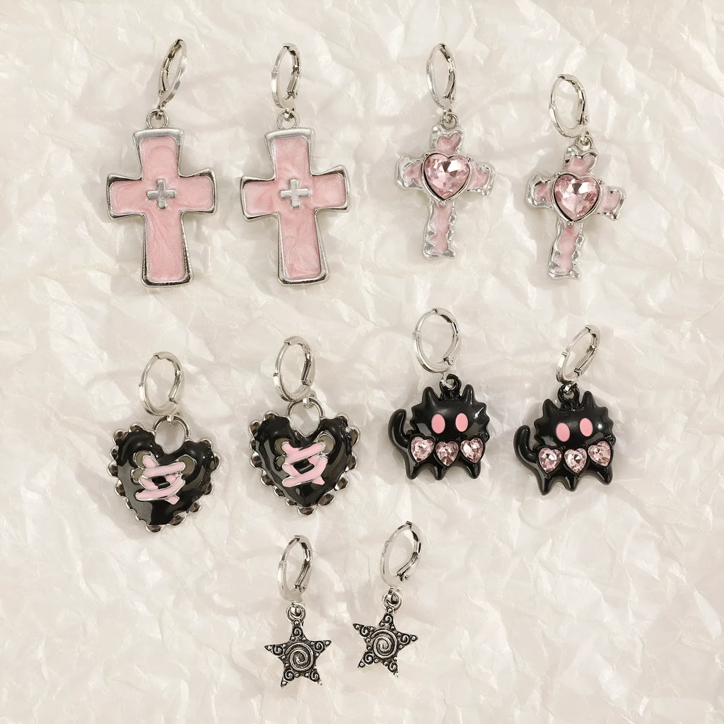 Women's alloy earrings with cross, heart, animal, and zodiac designs in white, black cat, and antique silver finishes