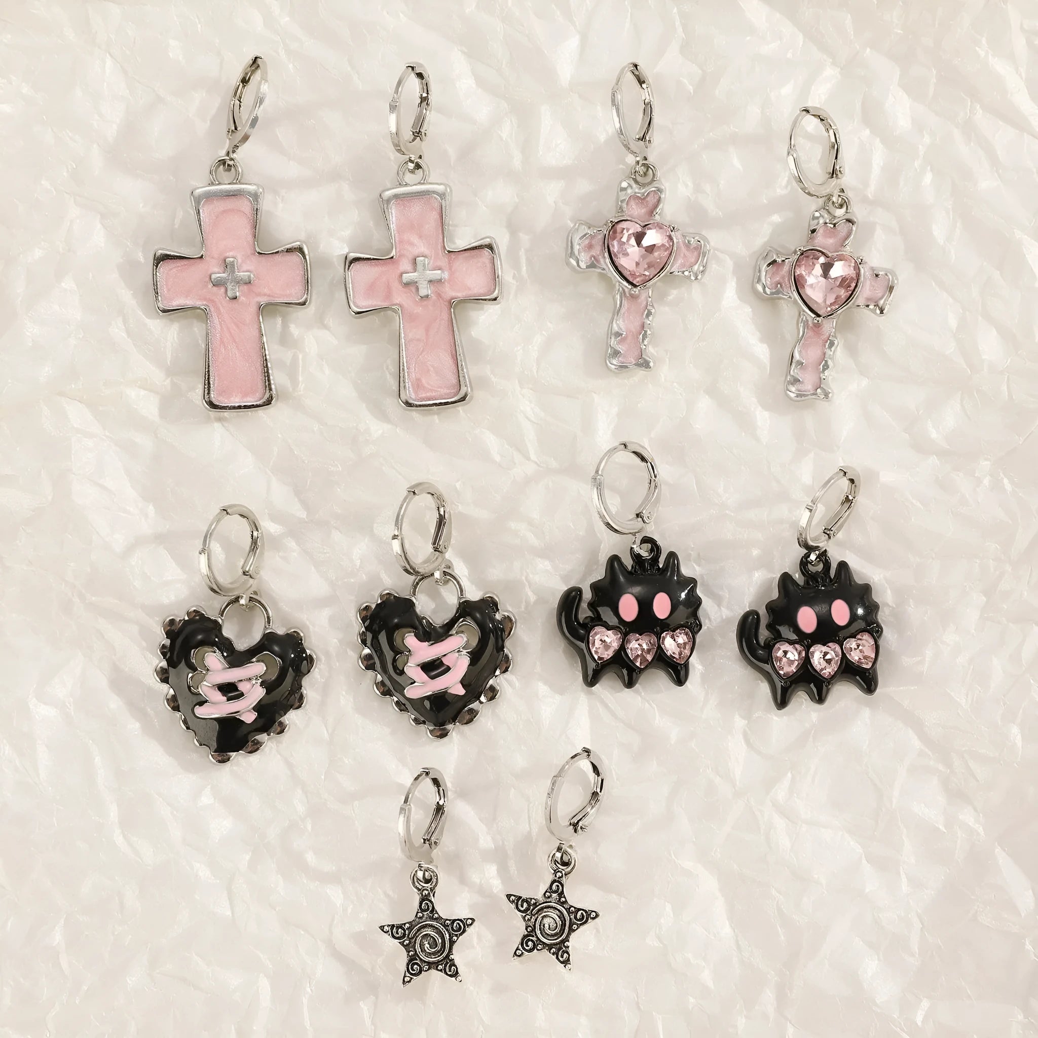 Women's alloy earrings with cross, heart, animal, and zodiac designs in white, black cat, and antique silver finishes