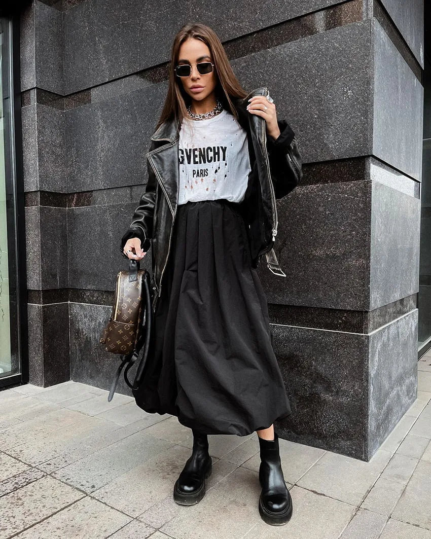 Women's cotton long skirt in solid black colour with elastic waistband and long length design