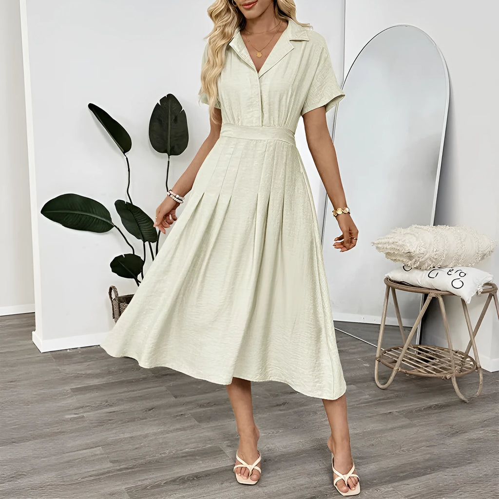 Light green women's shirt dress with lapel collar, waist tie, and side pockets