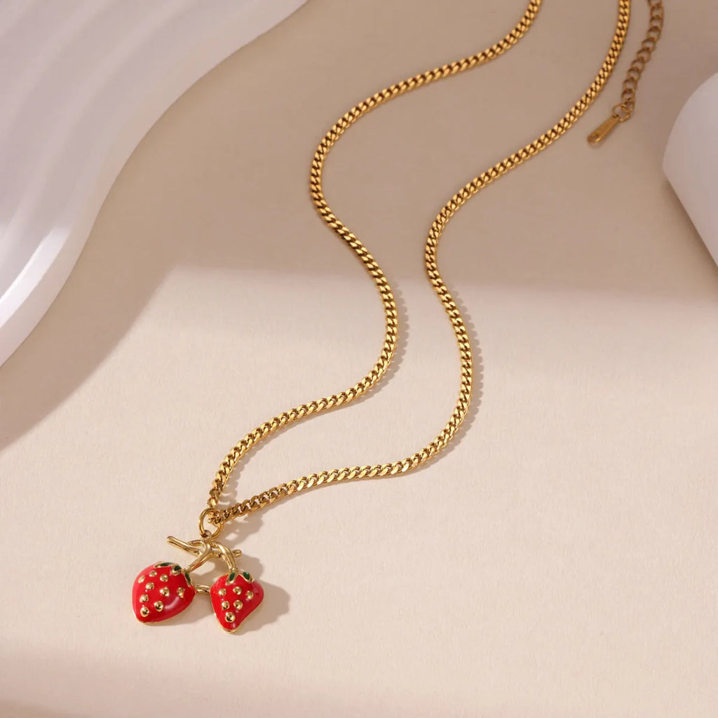 Women's stainless steel strawberry fruit pendant necklace in red and white gradient colours
