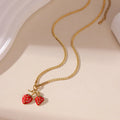 Women's stainless steel strawberry fruit pendant necklace in red and white gradient colours