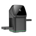 Black mobile phone magnetic wireless charging stand showing 180-degree rotation adjustment on a desk.
