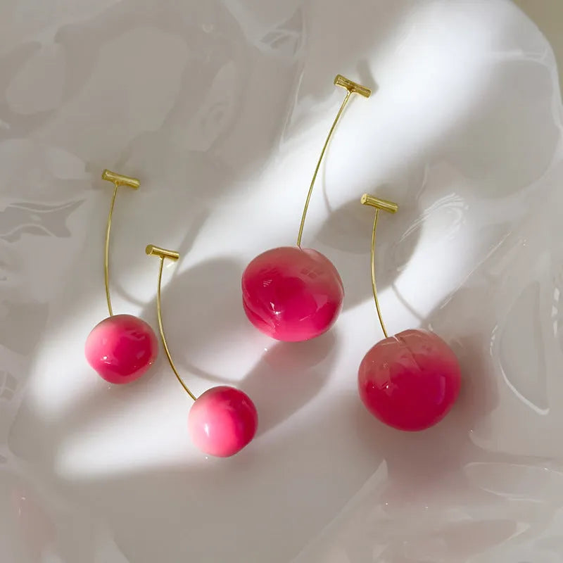Acrylic peach fruit earrings showing small and large size options with copper findings