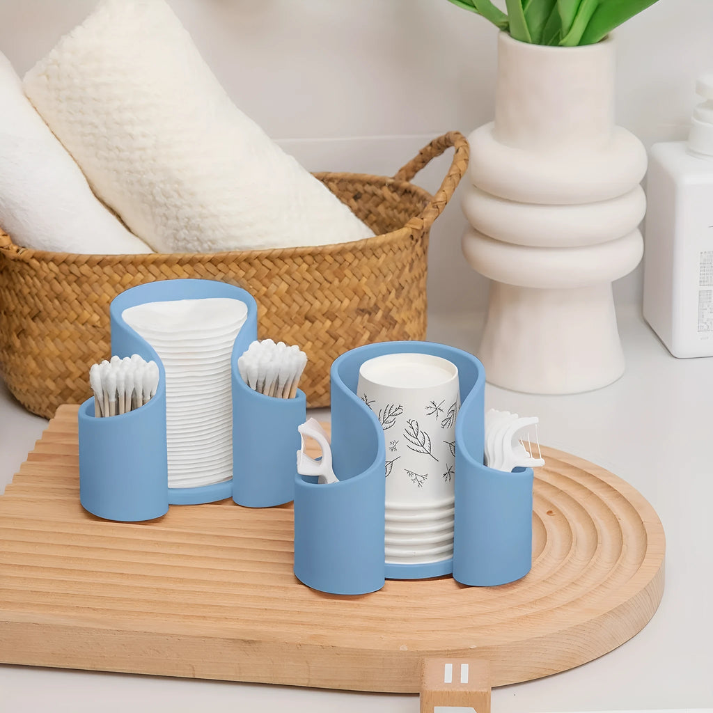 Solid colour plastic dental floss and cotton swab storage box in modern design.