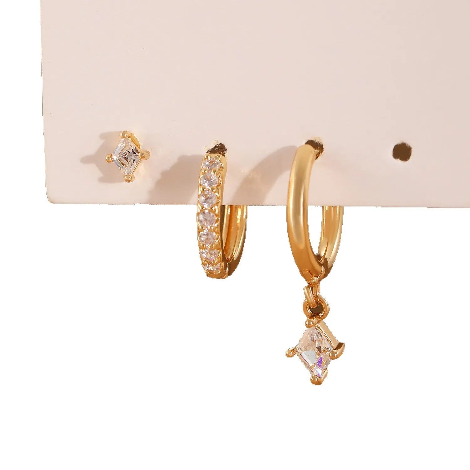Ladies three-piece earring set showing ear ring, stud earring and ear clip with zircon diamond geometry pendants