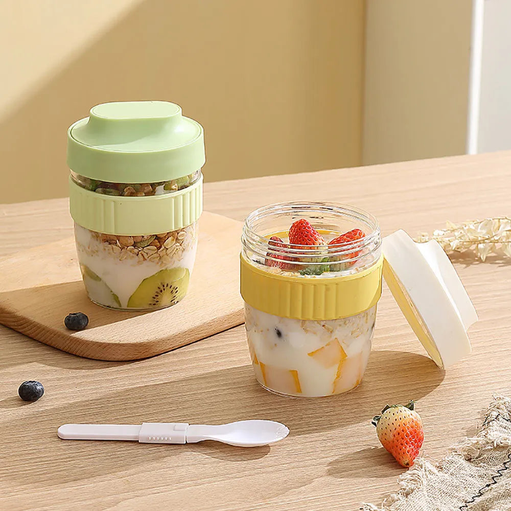 Green, purple, white, and pink plastic salad cups with lids and spoons in small and large sizes.