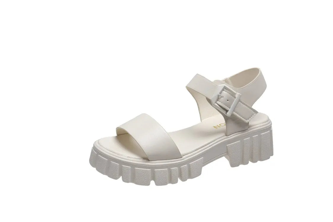 Beige women's peep toe platform sandals with ankle-strap buckle on a neutral background.