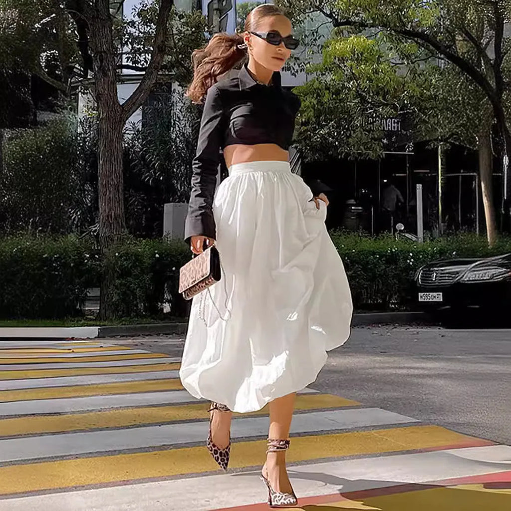 Women's cotton long skirt in solid black colour with elastic waistband and long length design