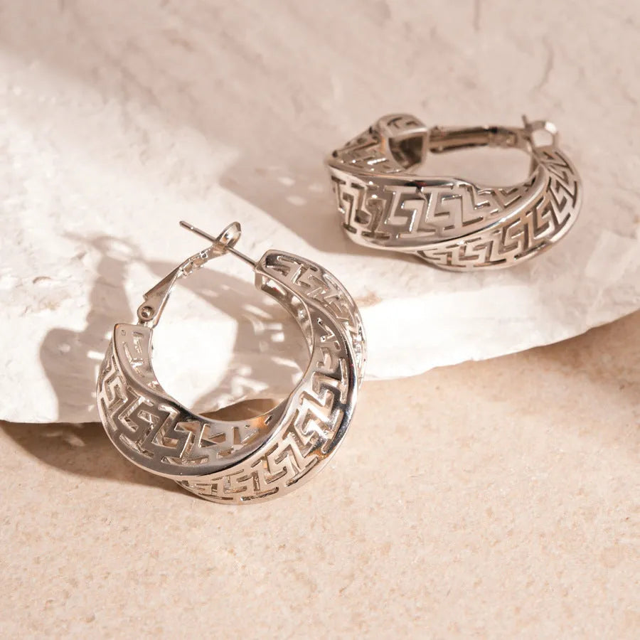 Geometric hollow stud earrings with twisted round design in gold electroplated finish