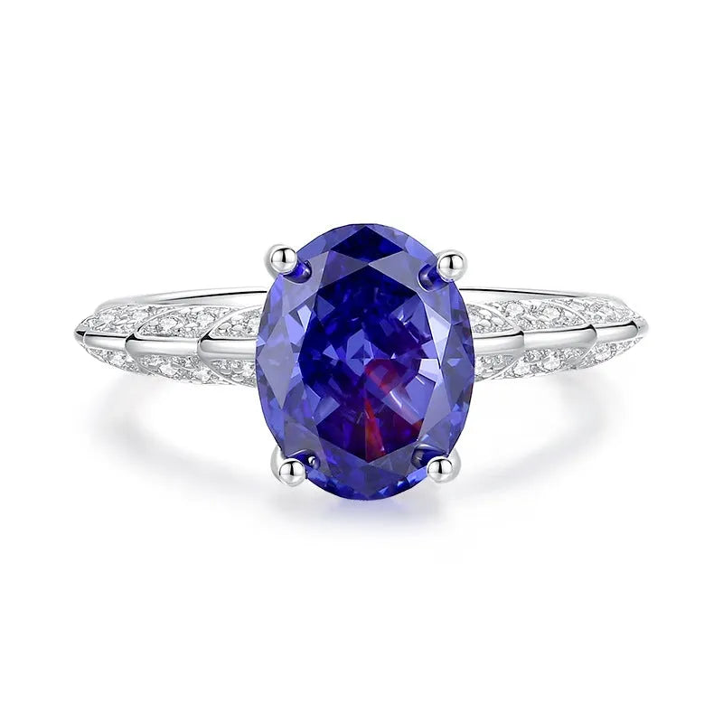 Heart-shaped sterling silver ring with a faceted ice flower cut zircon stone in a tan sang colour.