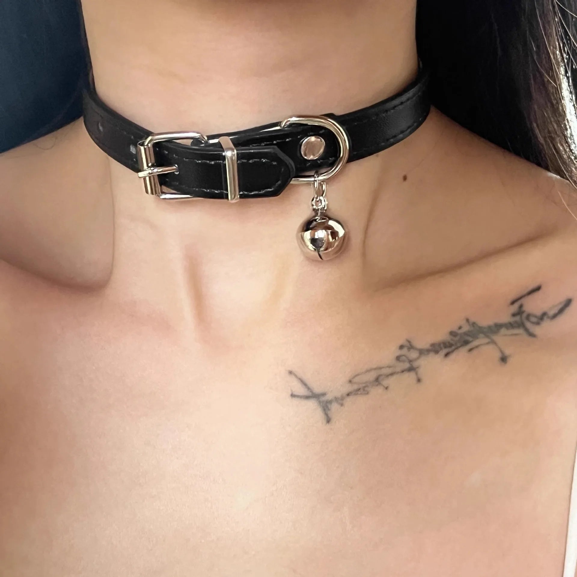 Black adjustable leather choker collar with a choice of cat paw, bone, or LD style charms.
