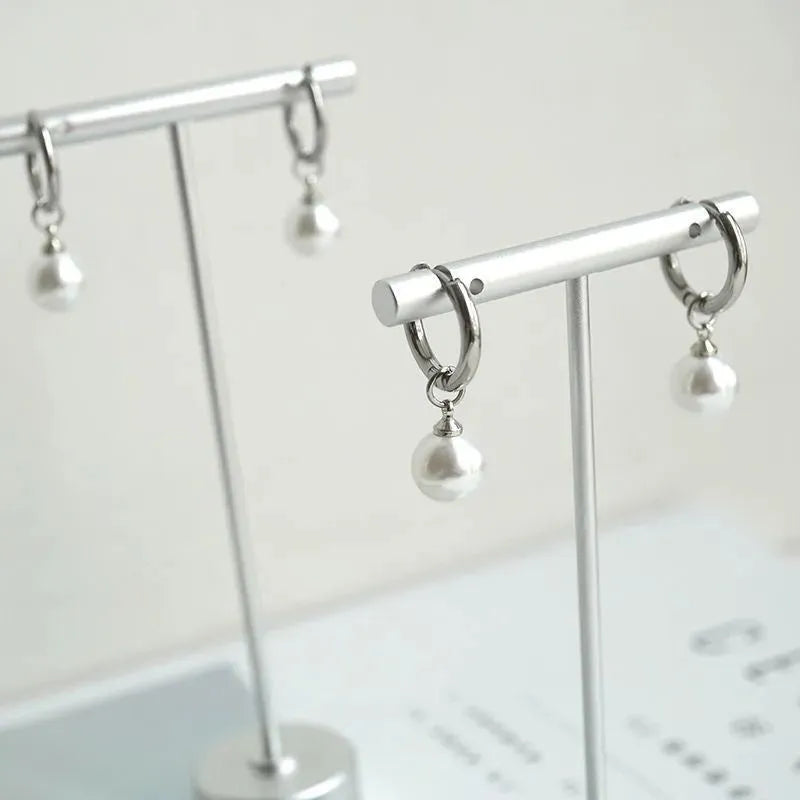 Geometric pearl drop earrings with alloy construction and titanium steel components
