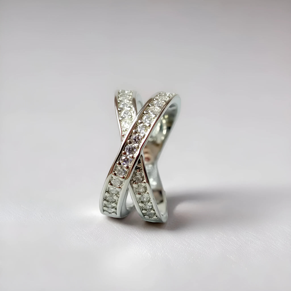 Silver and rose gold metal cross ring with micro-inlaid zircon detailing in heart and geometric design