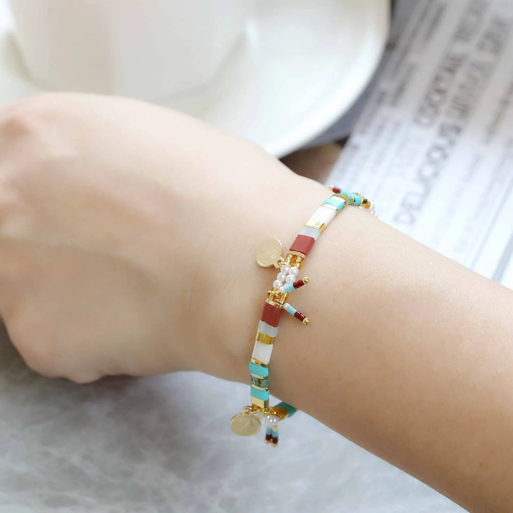 Women's glass coloured beaded bracelet with imitation pearl elements in original design