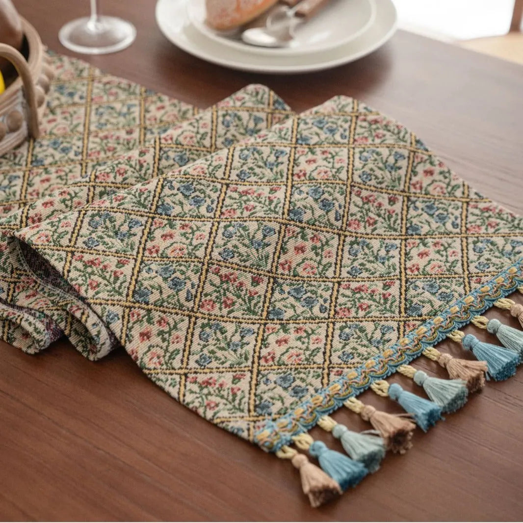Nordic striped jacquard table runner with tassel trim in dark blue colour.
