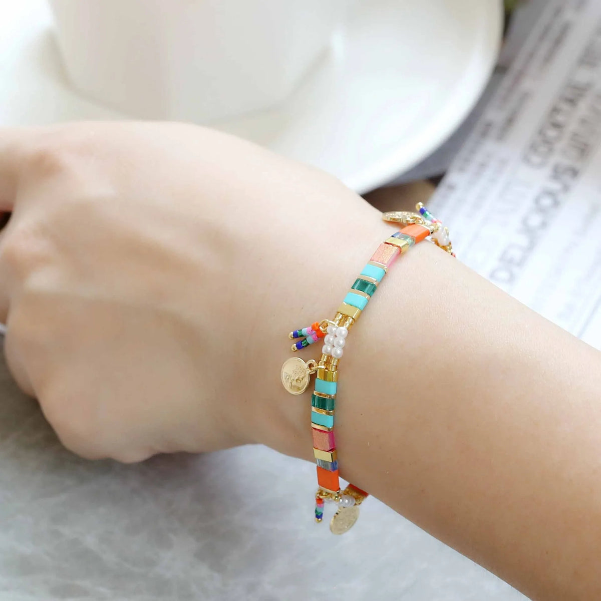 Women's glass coloured beaded bracelet with imitation pearl elements in original design