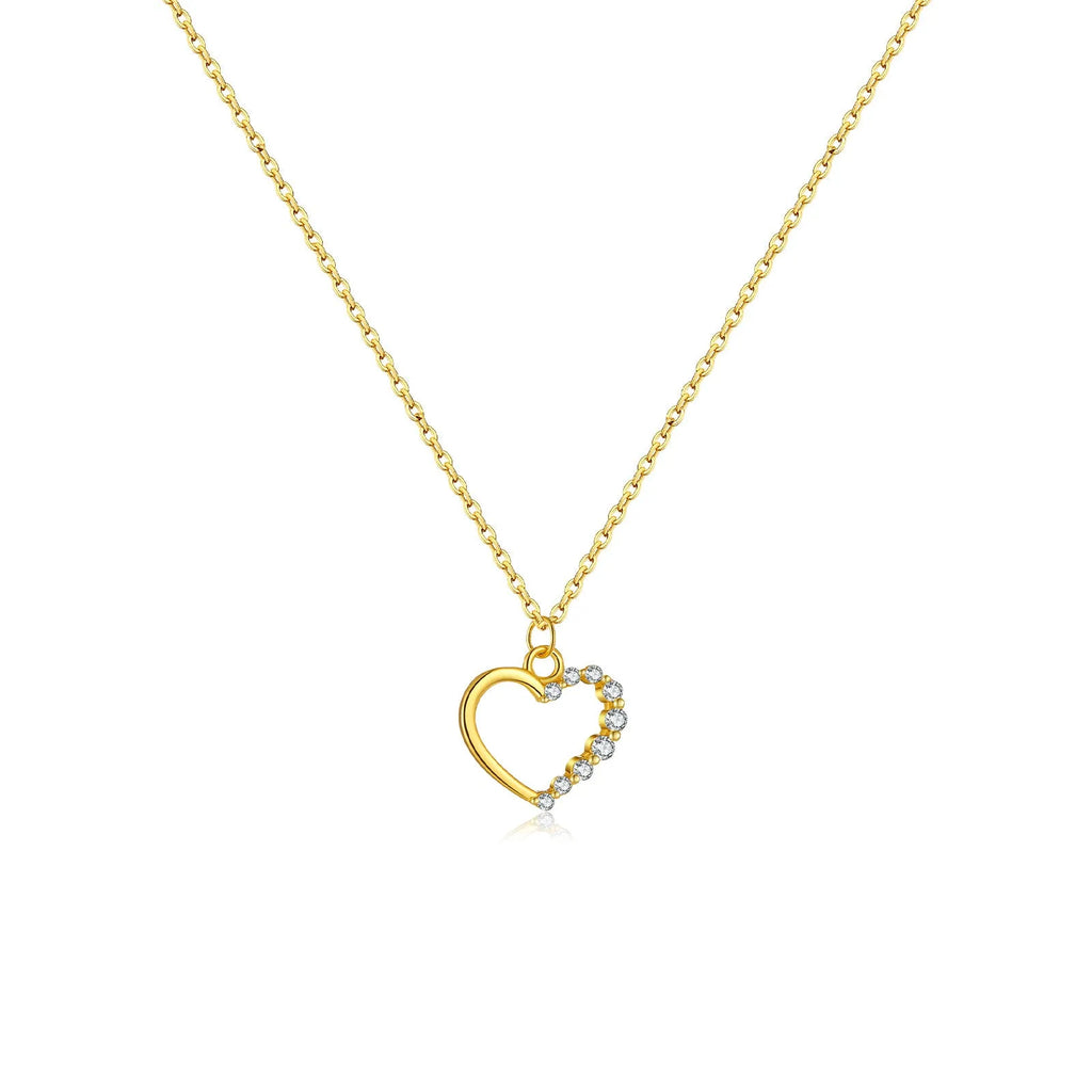 S925 sterling silver hollow heart pendant necklace on a chain with a gold plated finish.