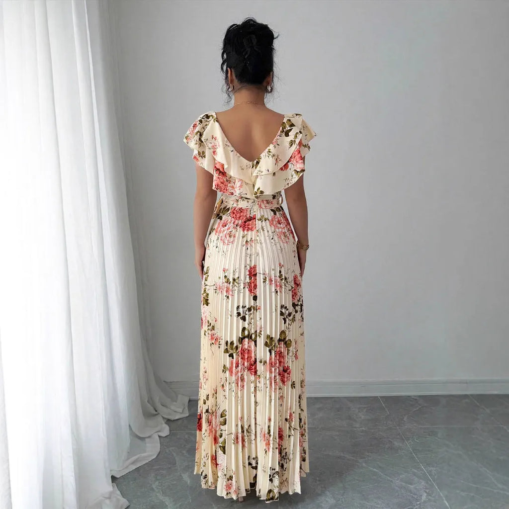 Apricot floral print dress with V-neck, ruffled short sleeves, and oversized swing skirt