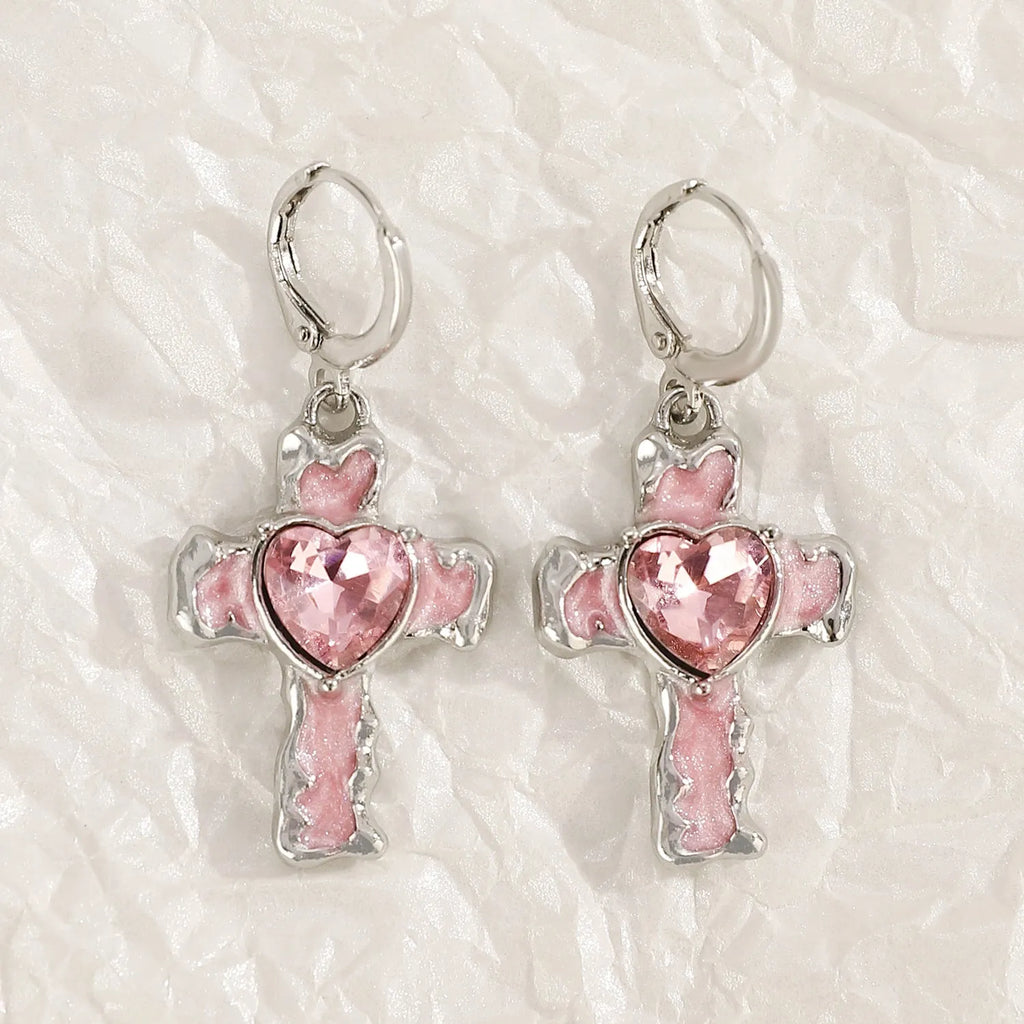Women's alloy earrings with cross, heart, animal, and zodiac designs in white, black cat, and antique silver finishes