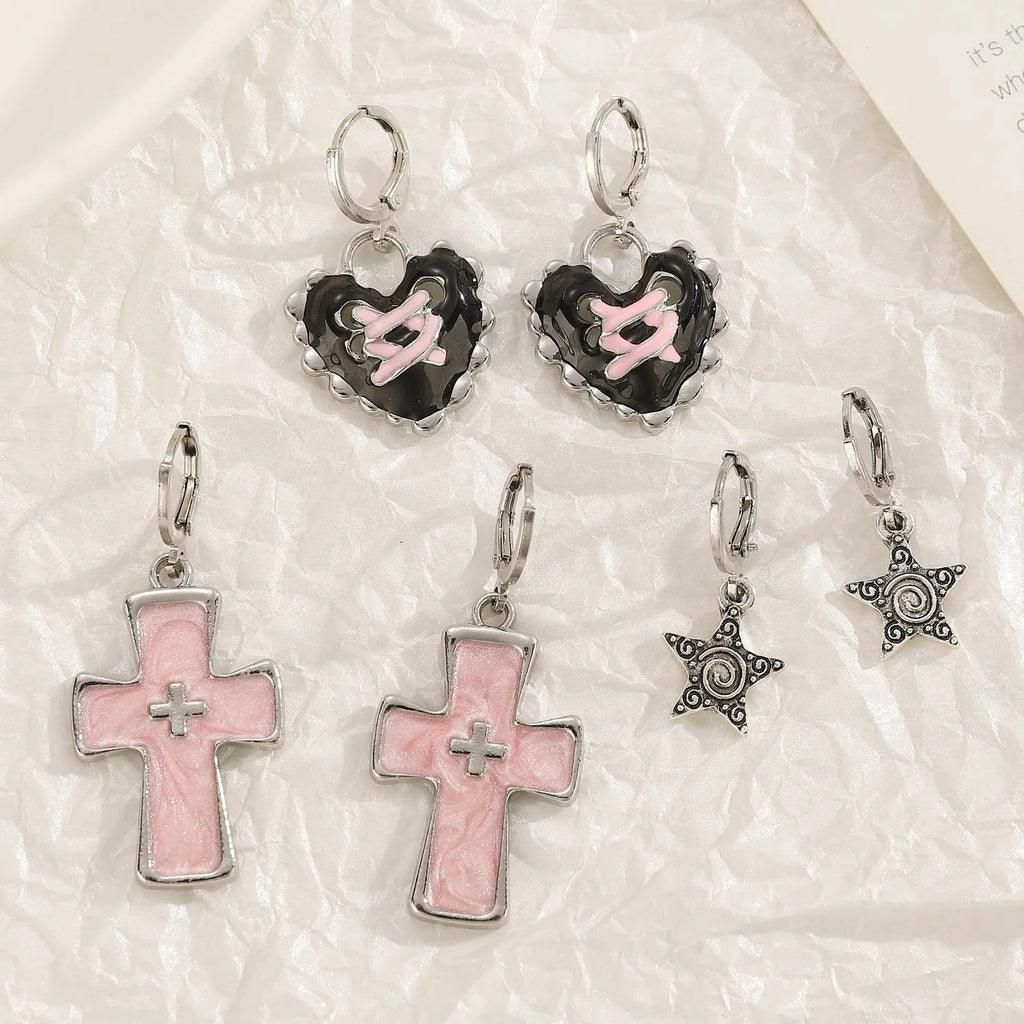 Women's alloy earrings with cross, heart, animal, and zodiac designs in white, black cat, and antique silver finishes