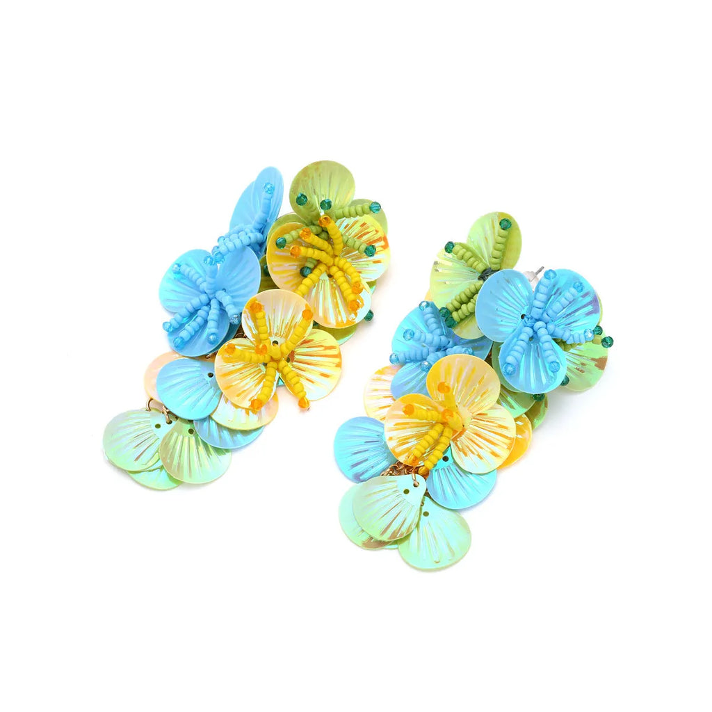 Handmade string bead flower earrings in colourful, rose and purple options with exaggerated dopamine style