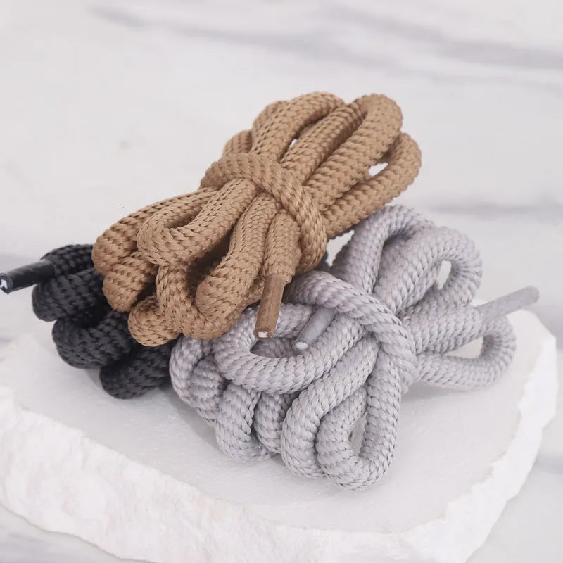 A pair of oval, round cross-section shoelaces in a chosen colour, showing the 1.0cm width.