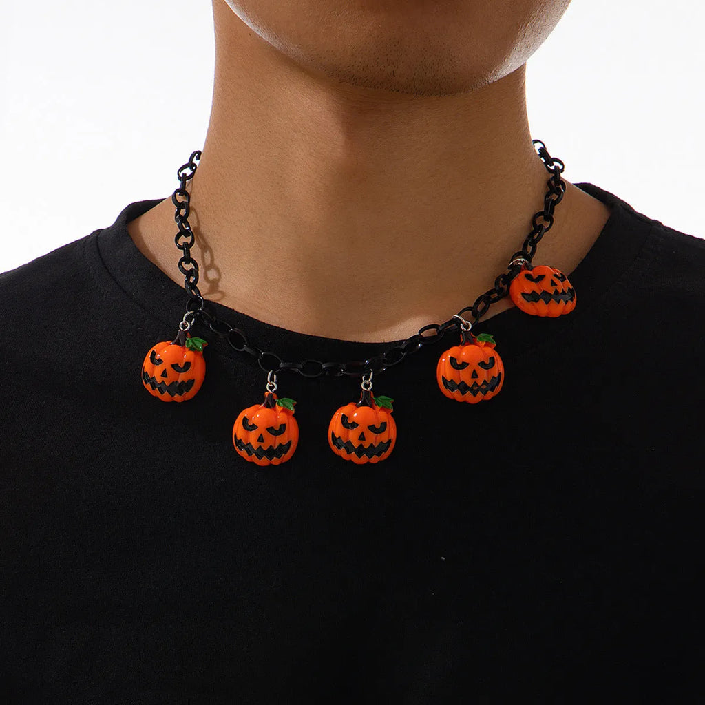 Cartoon pumpkin Halloween necklace with mixed colour acrylic pendant on a regular chain.