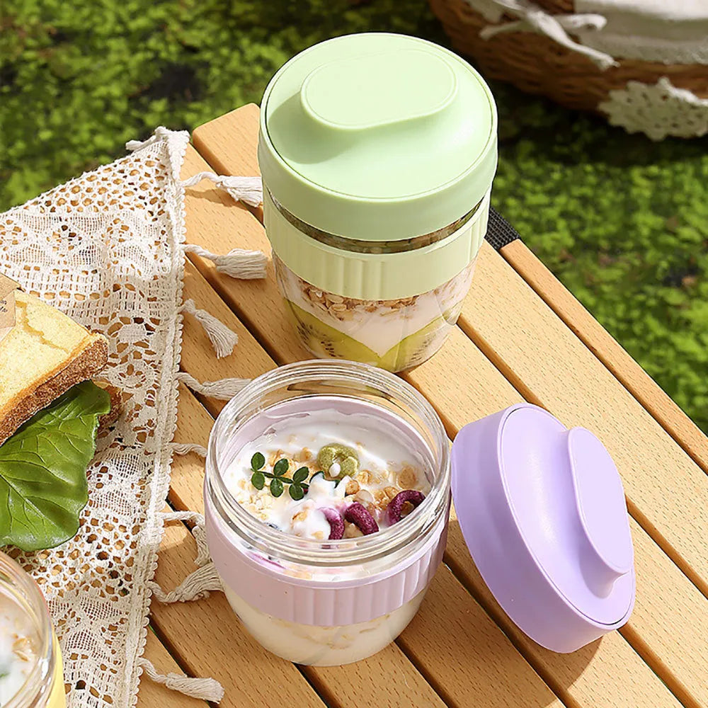 Green, purple, white, and pink plastic salad cups with lids and spoons in small and large sizes.