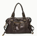 Women's retro motorcycle messenger shoulder bag in brown with woven detail accents and horizontal square shape