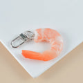PVC shrimp-shaped keychain with detailed crustacean design and door buckle attachment