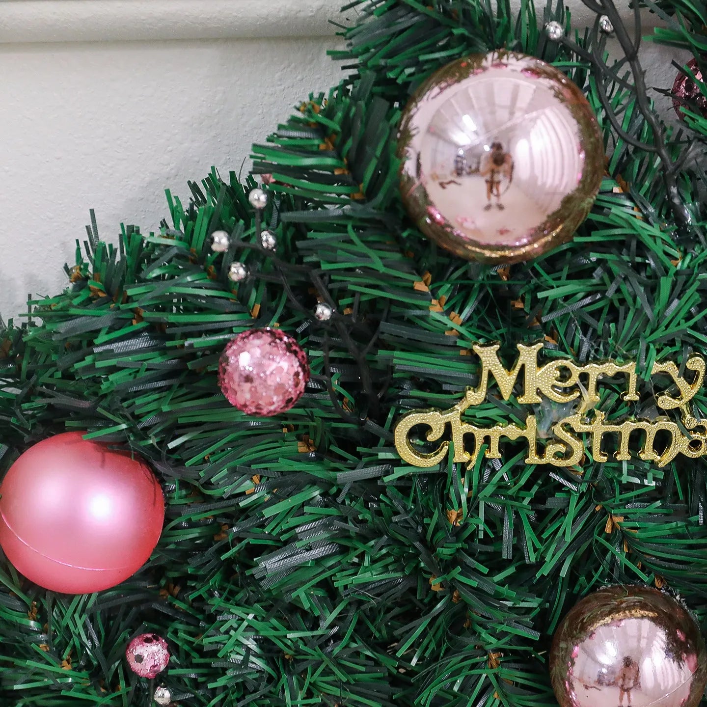 2.7 metre pink Christmas rattan garland decoration with small fruit details and optional lighting