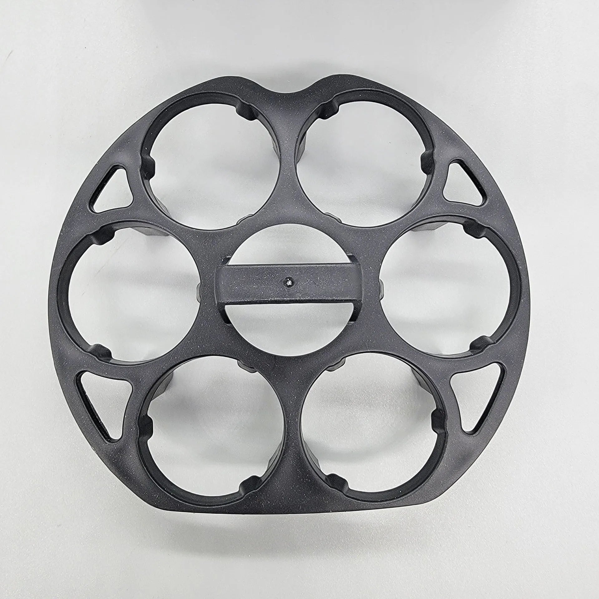 Black plastic egg holder basket with dimensions 13.8 by 12.6 by 5.7 centimetres