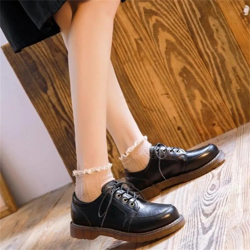 Women's preppy retro mary jane shoes in black with front lace-up design and low square heel